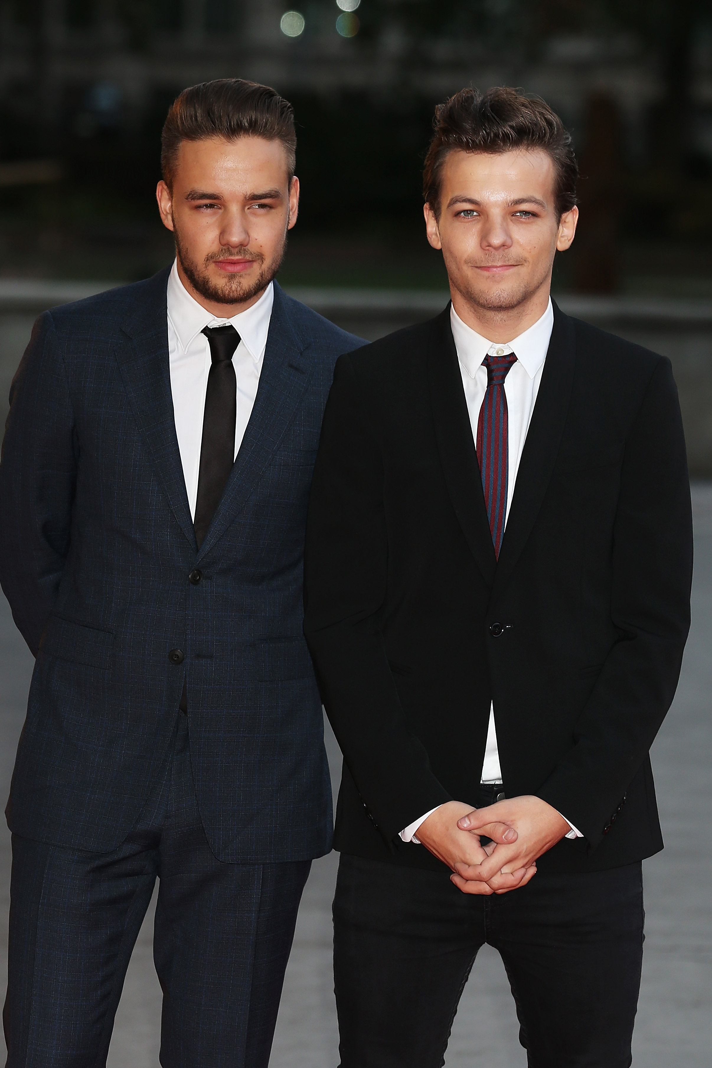 Louis Tomlinson et Liam Payne assistent au bal de Cendrillon Believe in Magic à Londres le 10 août 2015 | Source : Getty Images