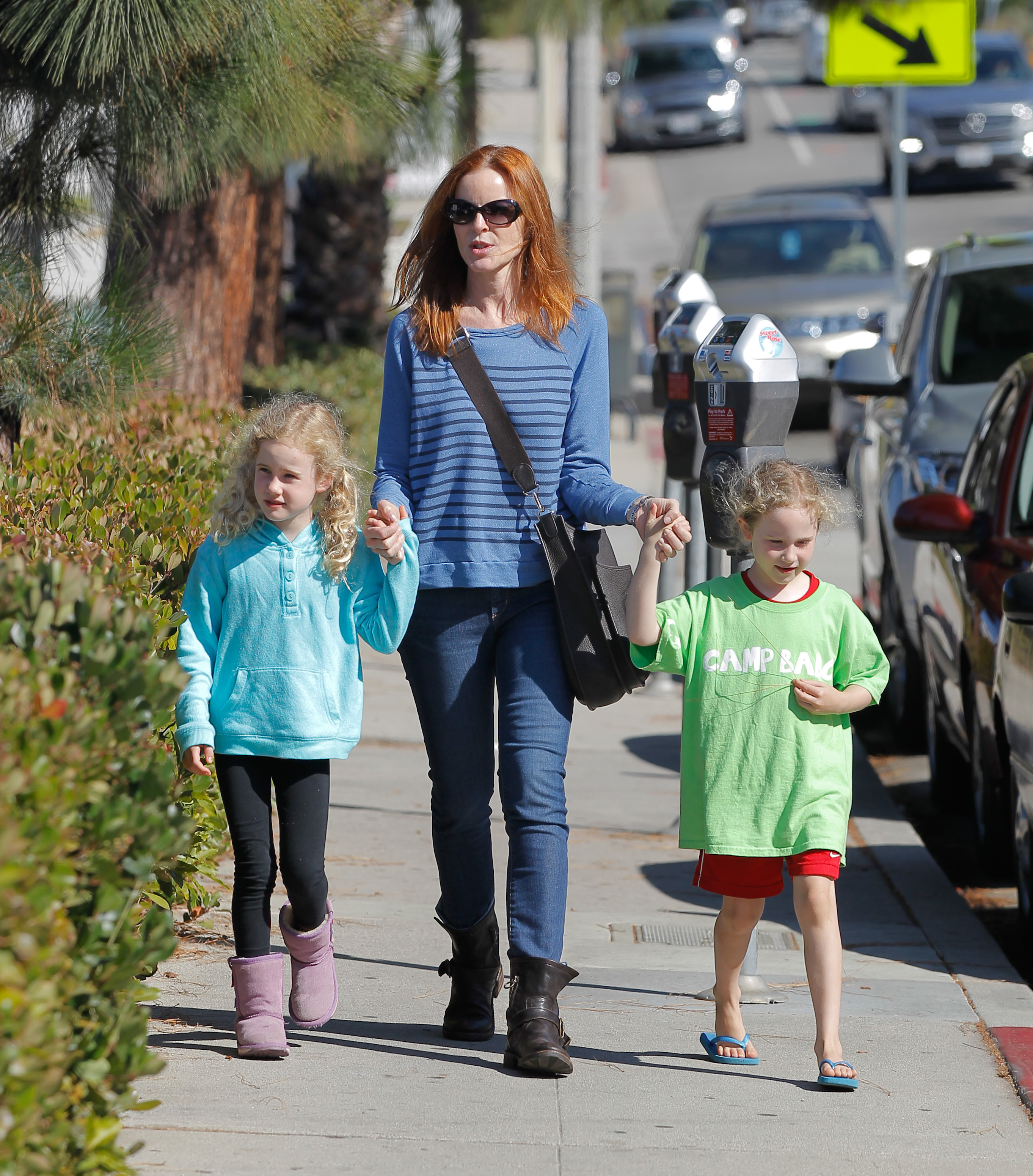 Marcia Cross et Savannah Mahoney et Eden Mahoney vues le 10 août 2013 à Los Angeles. | Source : Getty Images