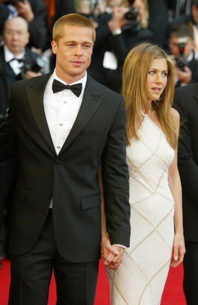 Brad Pitt et Jennifer Aniston au Palais de Festival le 13 mai 2004 à Cannes, France | Photo: Getty Images