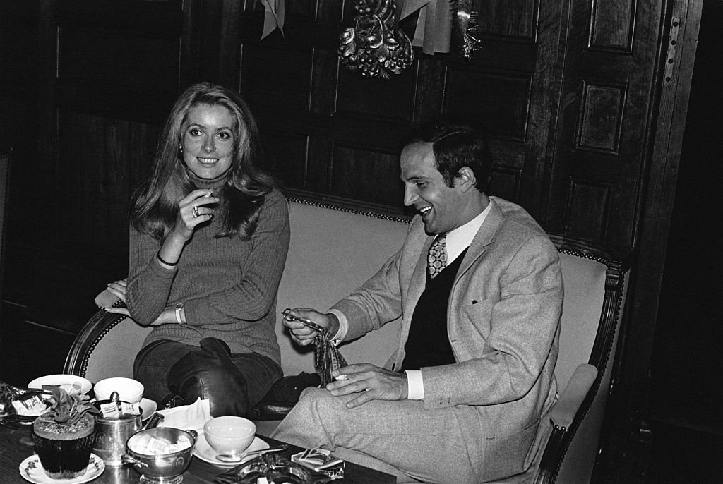 Catherine Deneuve et François Truffaut à une soirée. | Photo : Getty Images