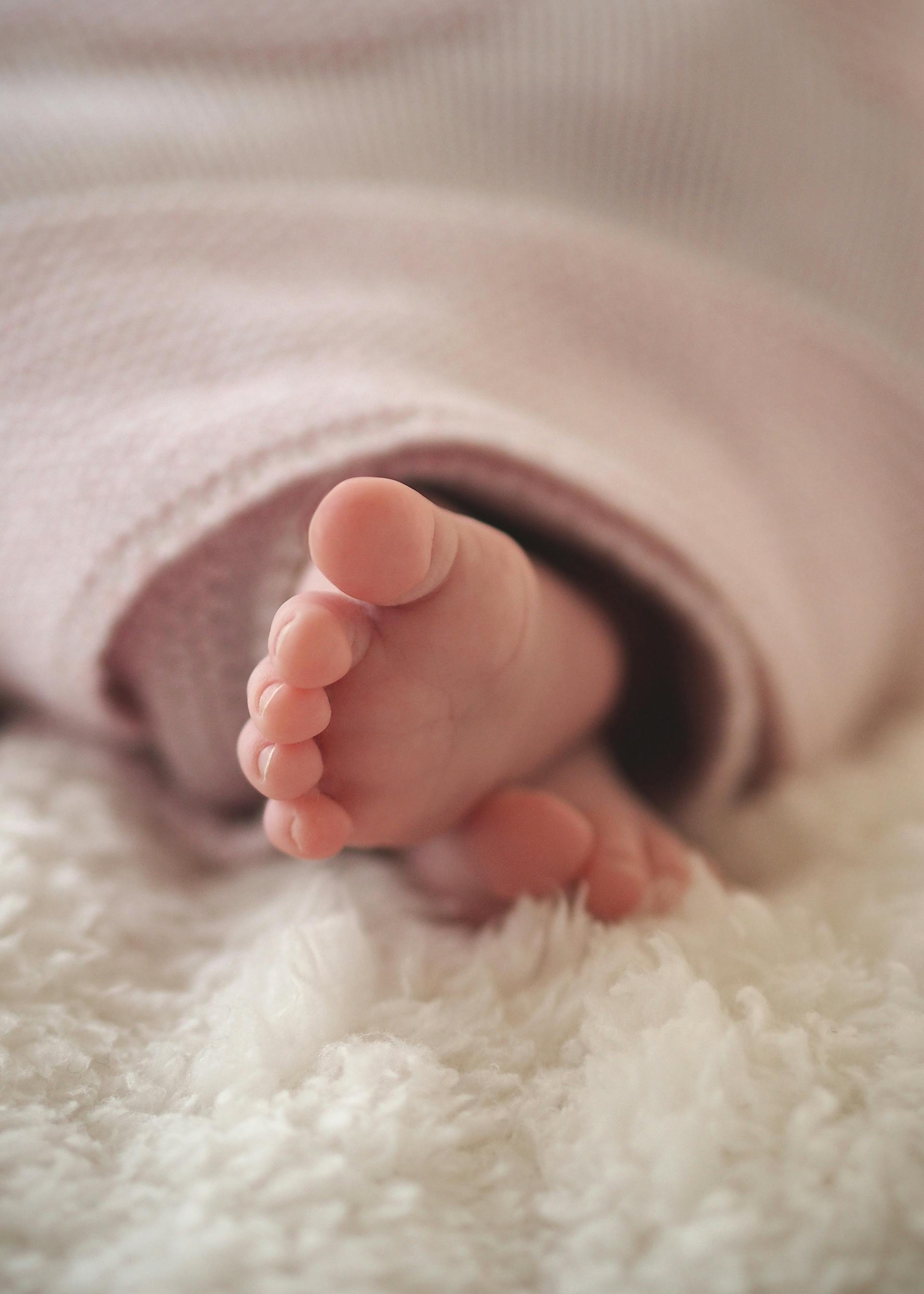 Les pieds d'un nouveau-né | Source : Pexels