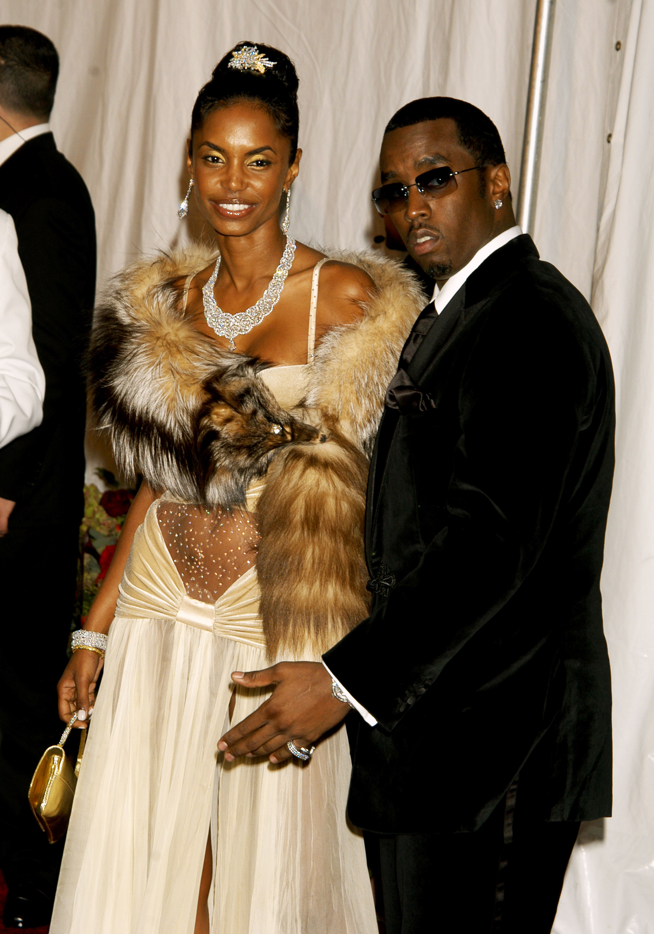 Kim Porter et Sean "P. Diddy" Combs lors de la fête d'anniversaire de Diddy le 4 novembre 2004 | Source : Getty Images