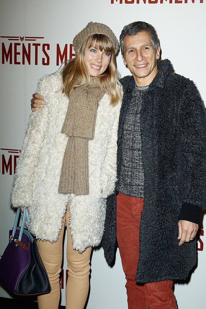 Nagui et sa femme Melanie Page assistent à la première de "Monuments Men" au Cinéma UGC Normandie le 12 février 2014 à Paris, France. | Photo : Getty Images. 
