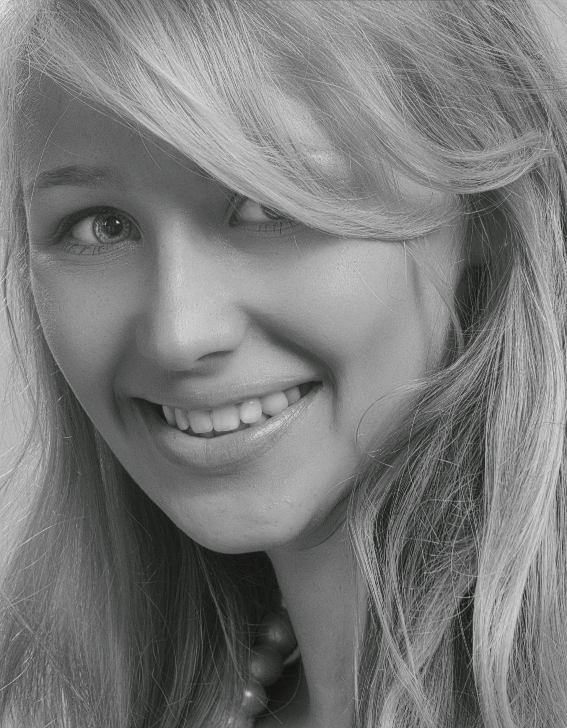 Une femme souriante | Source : Pexels