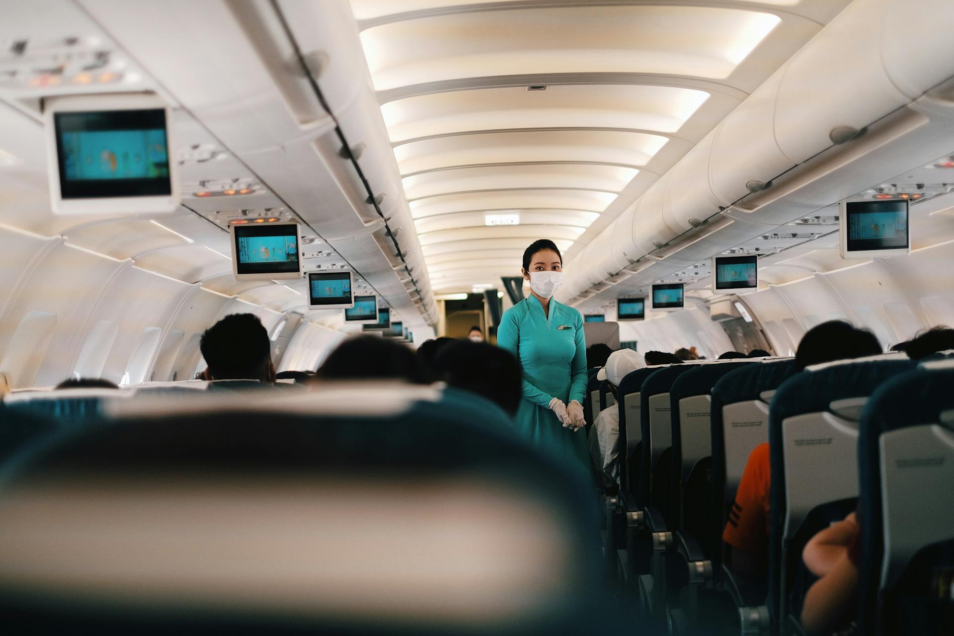 A flight attendant on a plane | Source: Pexels