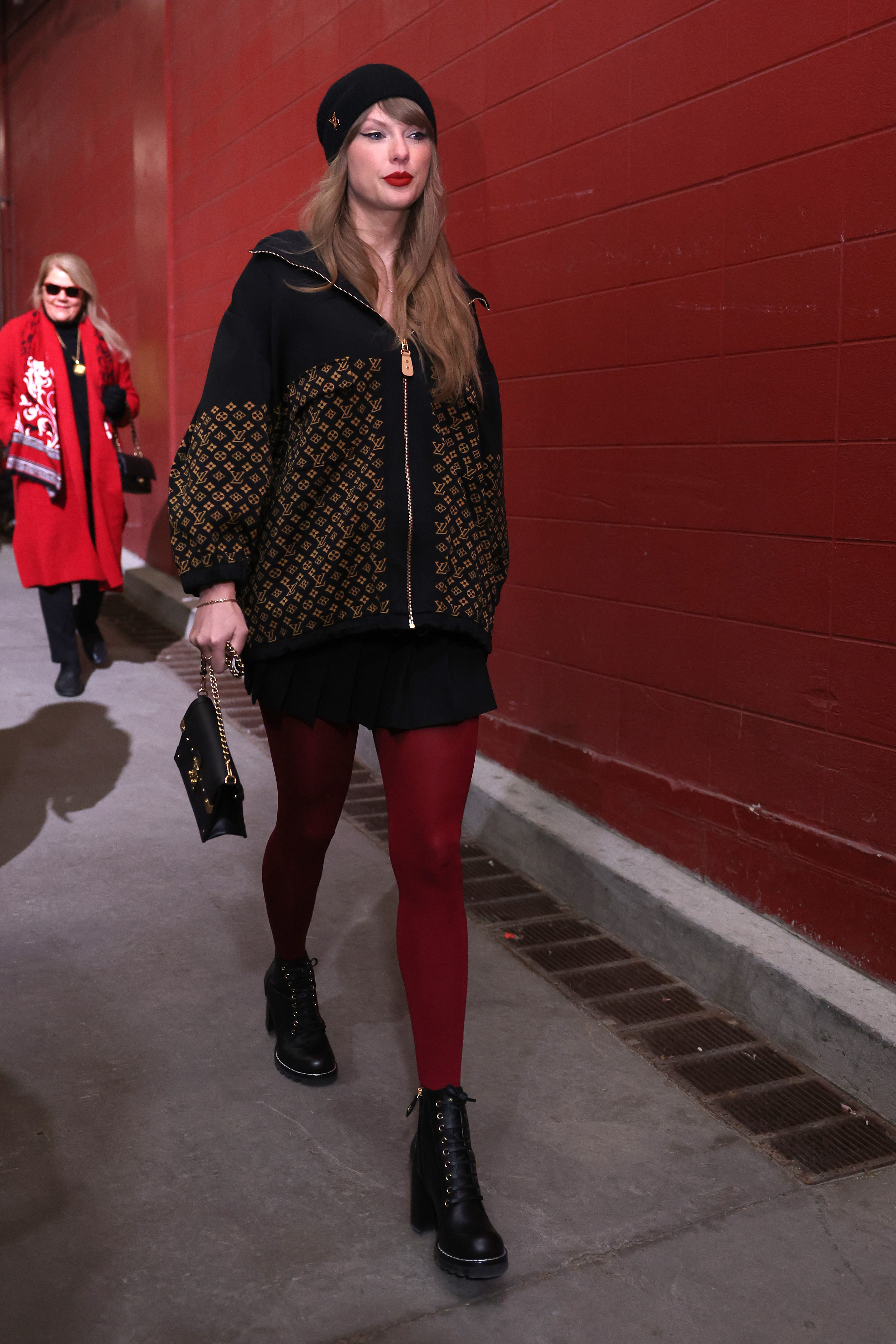 Taylor Swift en tenue Louis Vuitton au match de championnat de l'AFC | Source : Getty Images