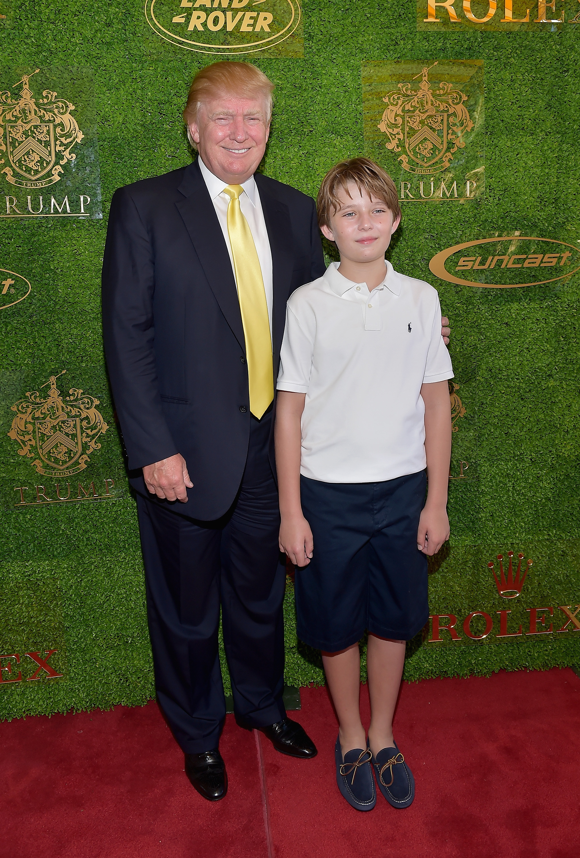Donald et Barron Trump lors du Grand Prix Trump Invitational au club Mar-a-Lago, le 4 janvier 2015, à Palm Beach, en Floride. | Source : Getty Images