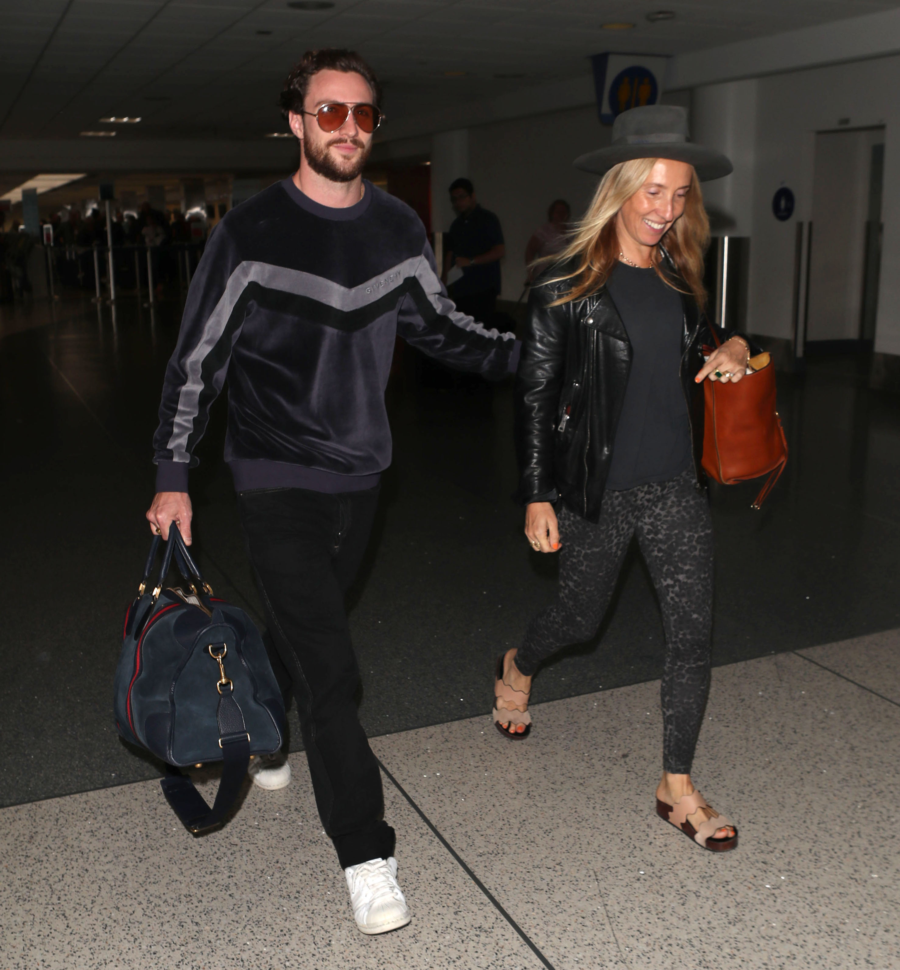 Aaron Taylor-Johnson et Sam Taylor-Johnson à LAX en 2018 | Source : Getty images