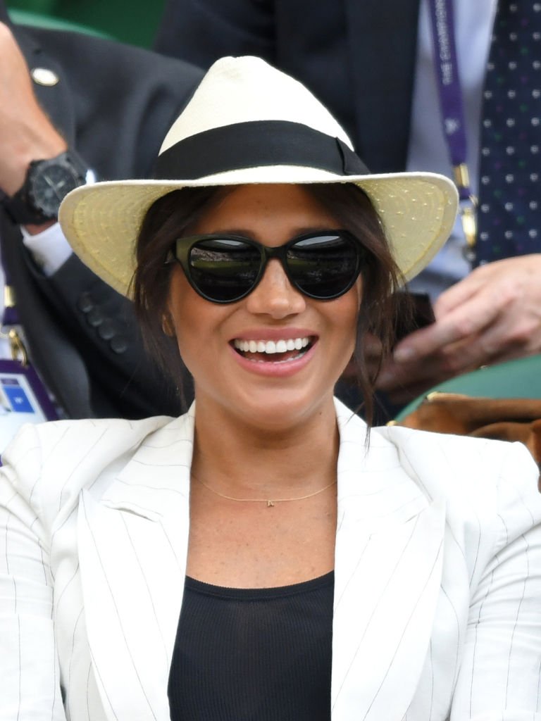 Meghan, Duchesse de Sussex assiste à la quatrième journée des Championnats de tennis de Wimbledon au All England Lawn Tennis and Croquet Club | Photo : Getty Images