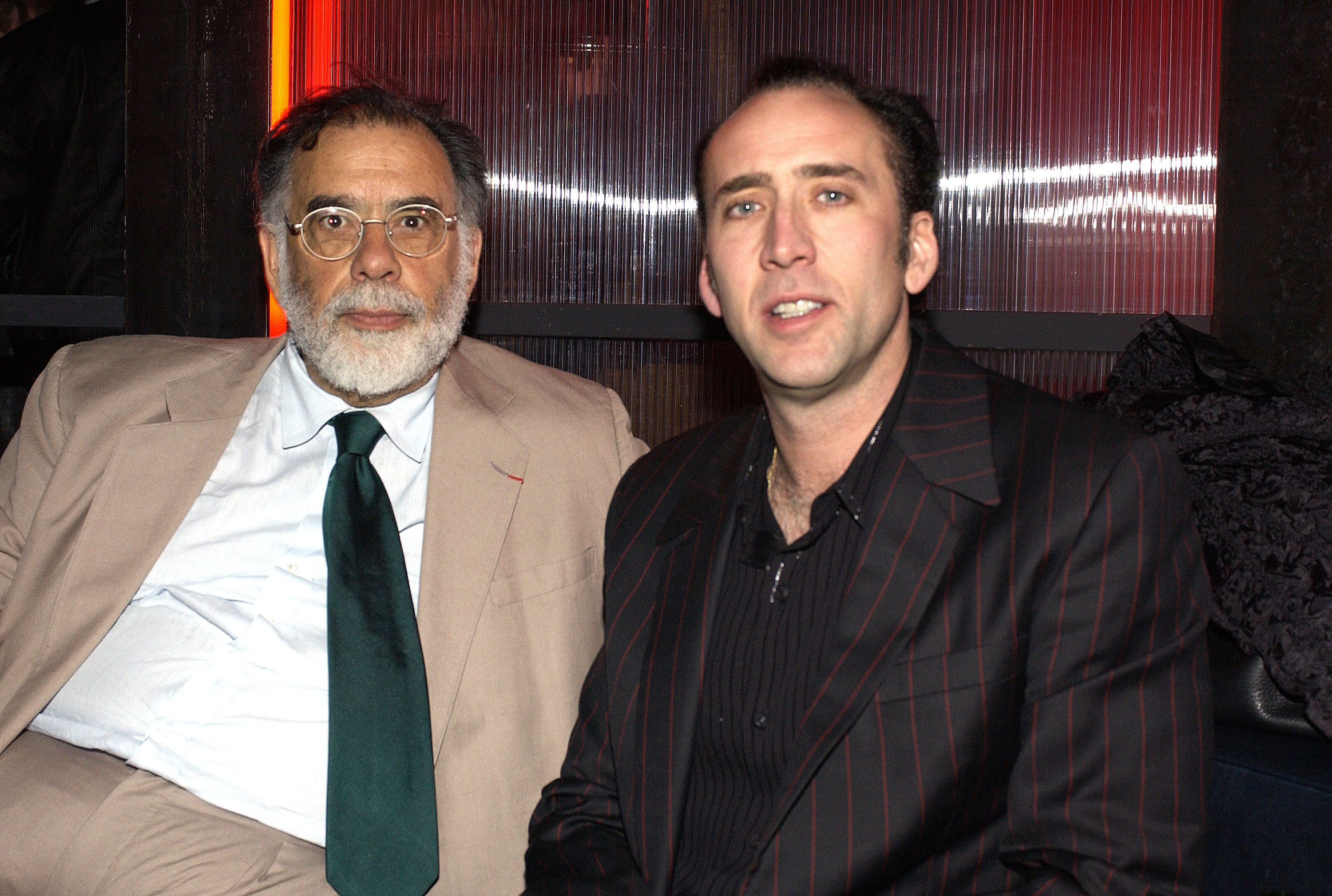 Francis Ford Coppola et Nicolas Cage lors d'une after-party le 17 mars 2003 à Hollywood, Californie. | Source : Getty Images