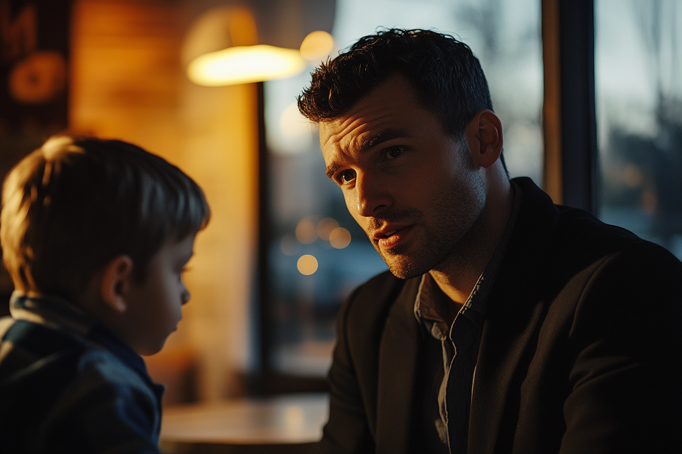 Un homme qui parle à un enfant | Source : Midjourney