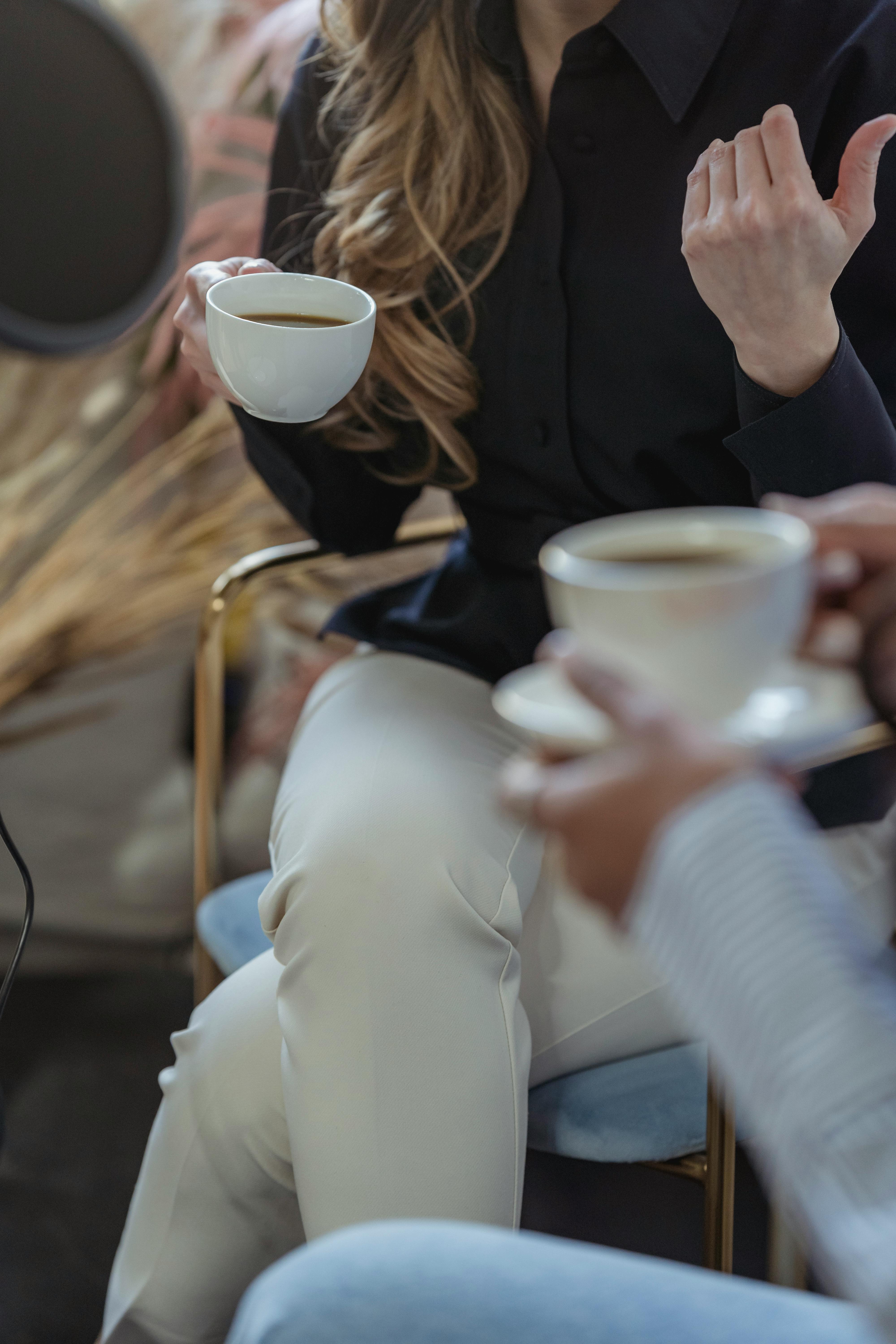 James and Natalie share an intimate moment at the airport cafe | Source: Pexels