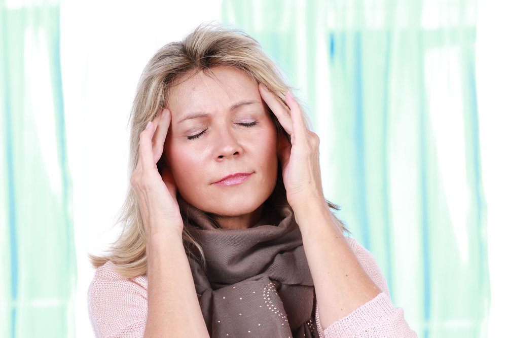 Une femme avec une migraine. l Source: Shutterstock
