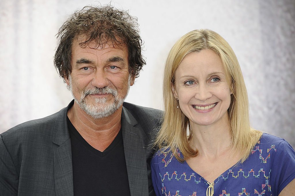 Le comédien Olivier Marchal aux côtés de sa femme en 2013. l Source : Getty Images