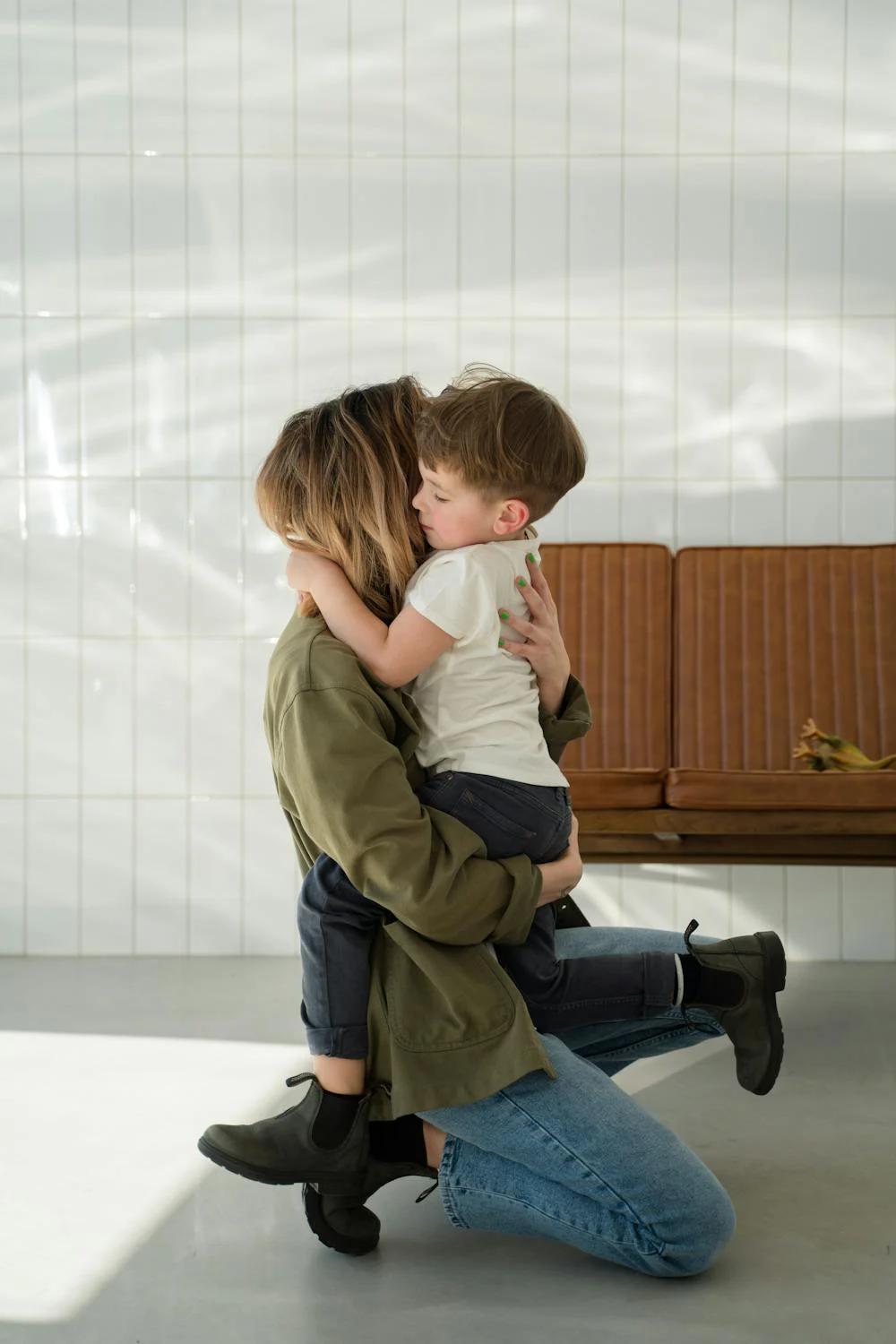 A boy hugging his mother | Source: Pexels