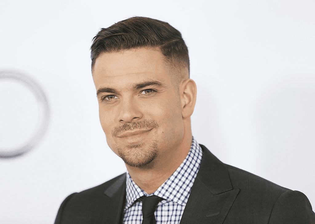 HOLLYWOOD, CA - 08 DECEMBRE : Mark Salling arrive à la 15ème édition annuelle du Trevor Project Benefit qui se tiendra au Hollywood Palladium le 8 décembre 2013 à Hollywood, Californie. | Photo : Getty Images