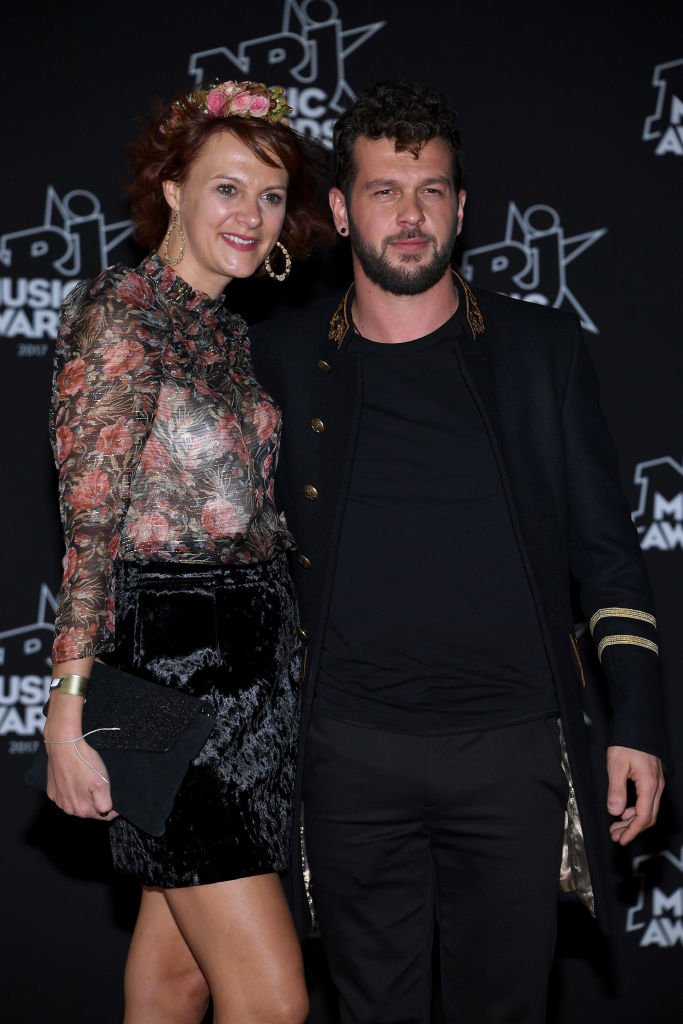 Claudio Capéo et sa femme assistent aux 20èmes NRJ Music Awards à Cannes. | Getty Images