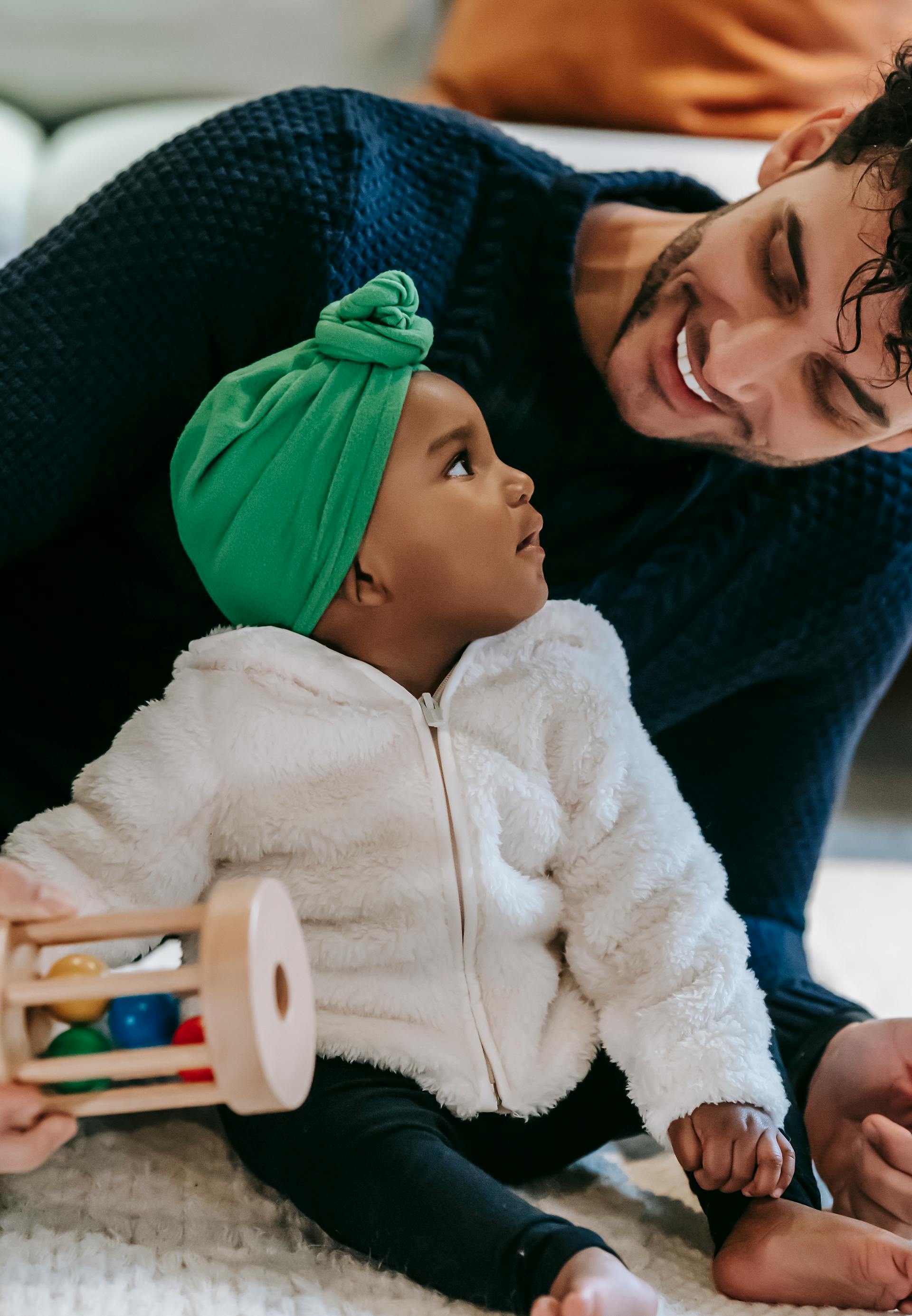 A man with a baby | Source: Pexels