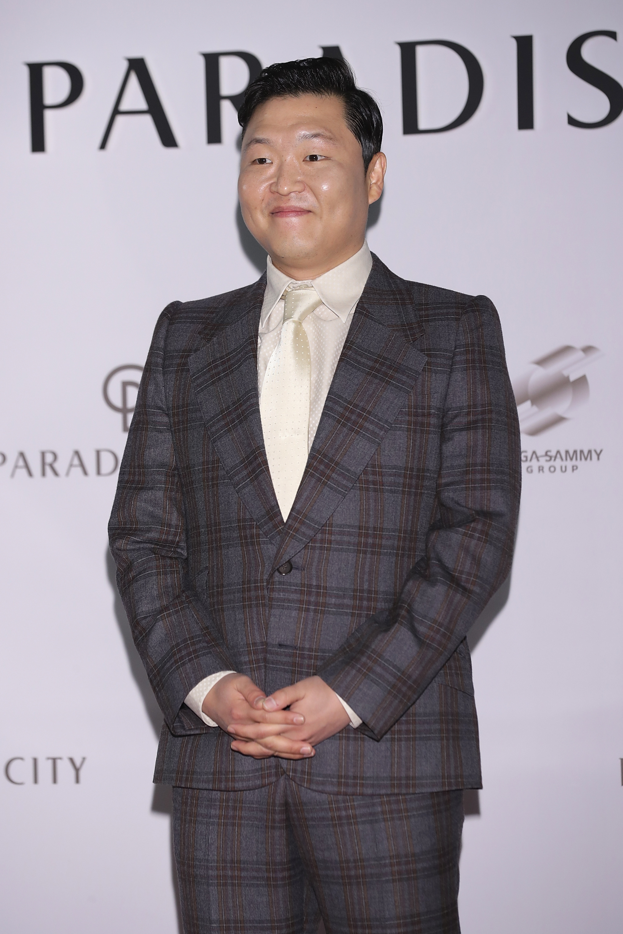 Psy lors de l'inauguration de "PARADISE CITY" le 20 avril 2017 à Incheon, en Corée du Sud. | Source : Getty Images