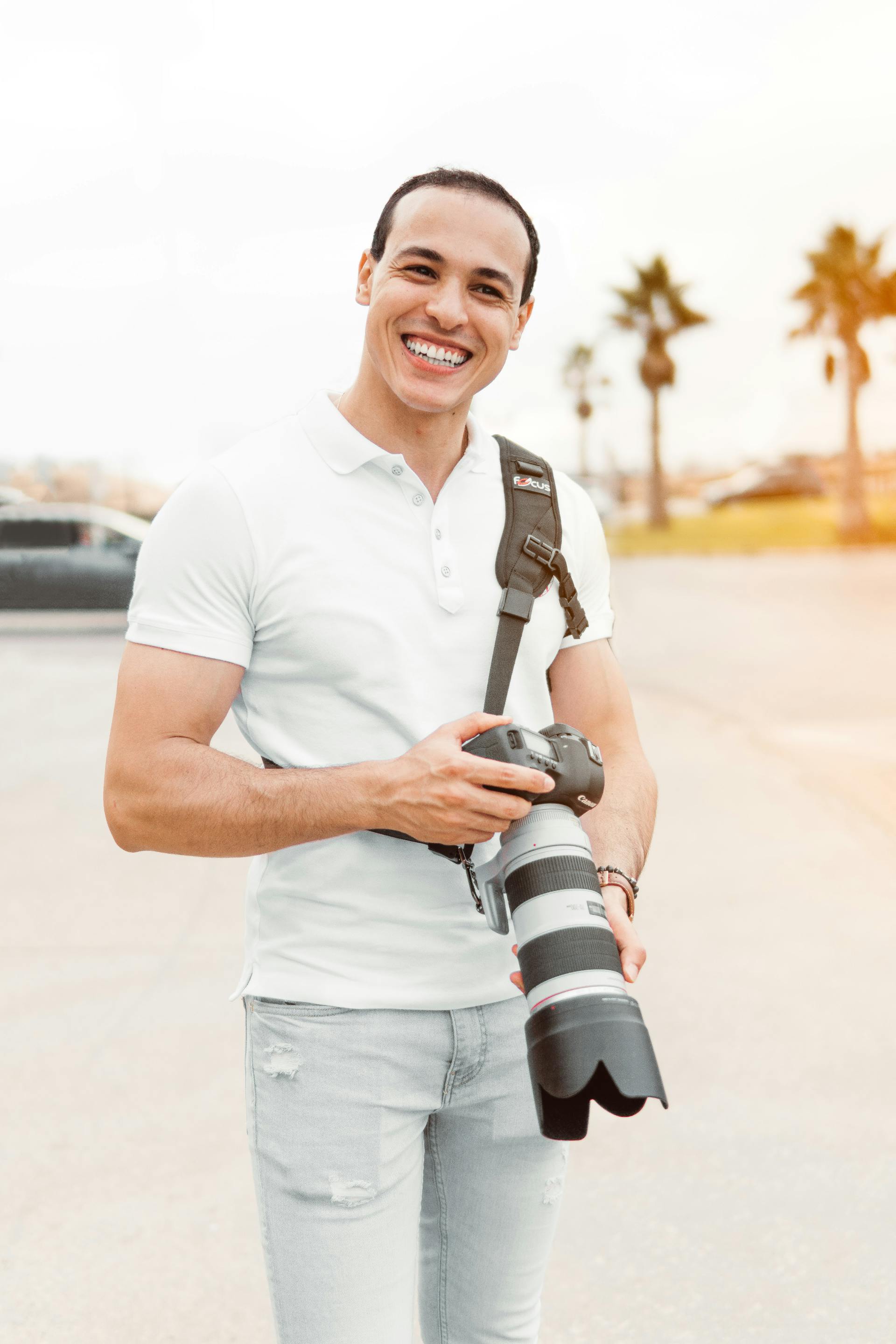 Un photographe souriant | Source : Pexels