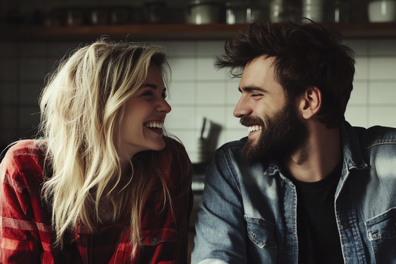 Un couple qui rit ensemble dans une cuisine | Source : Midjourney