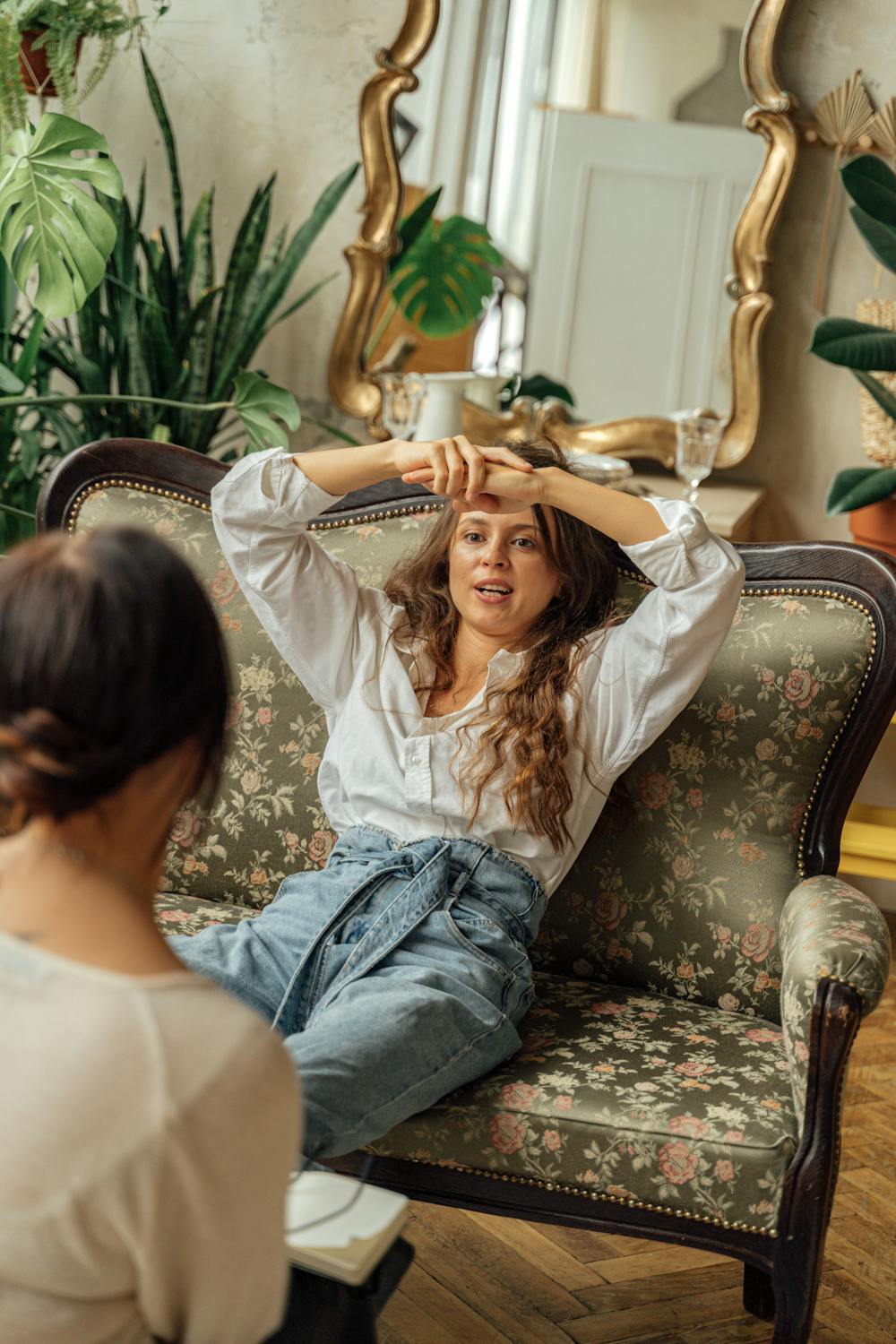 A woman relaxing on her sofa | Source: Pexels