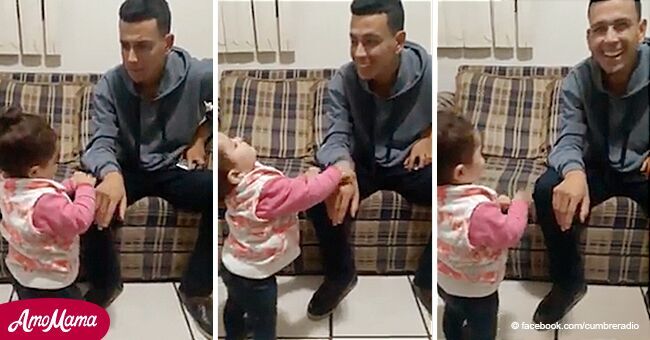 Une fillette de 2 ans utilise la langue des signes pour parler à son père sourd