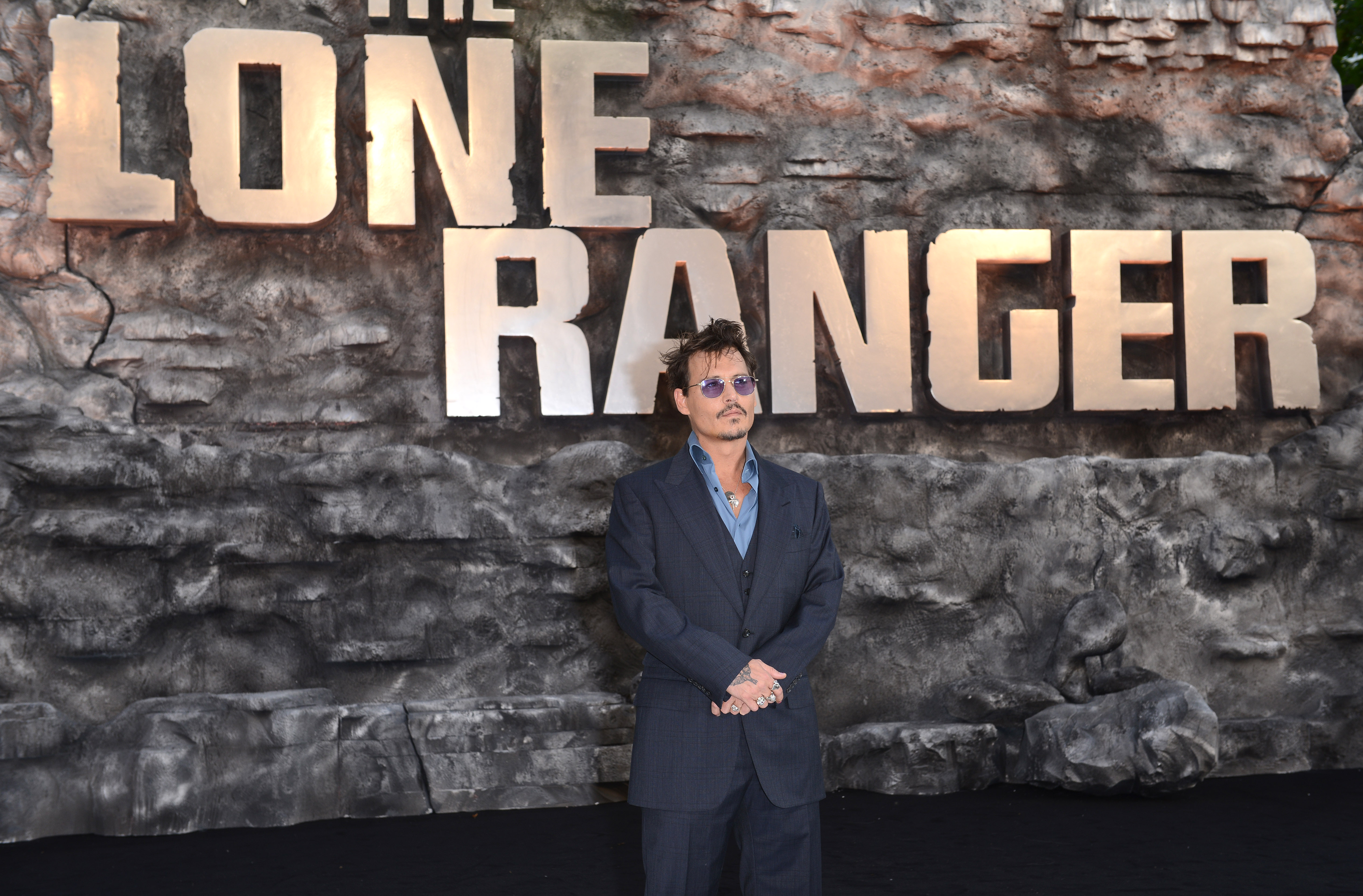 Johnny Depp lors de la première britannique de "The Lone Ranger" à Londres, en Angleterre, le 21 juillet 2013 | Source : Getty Images