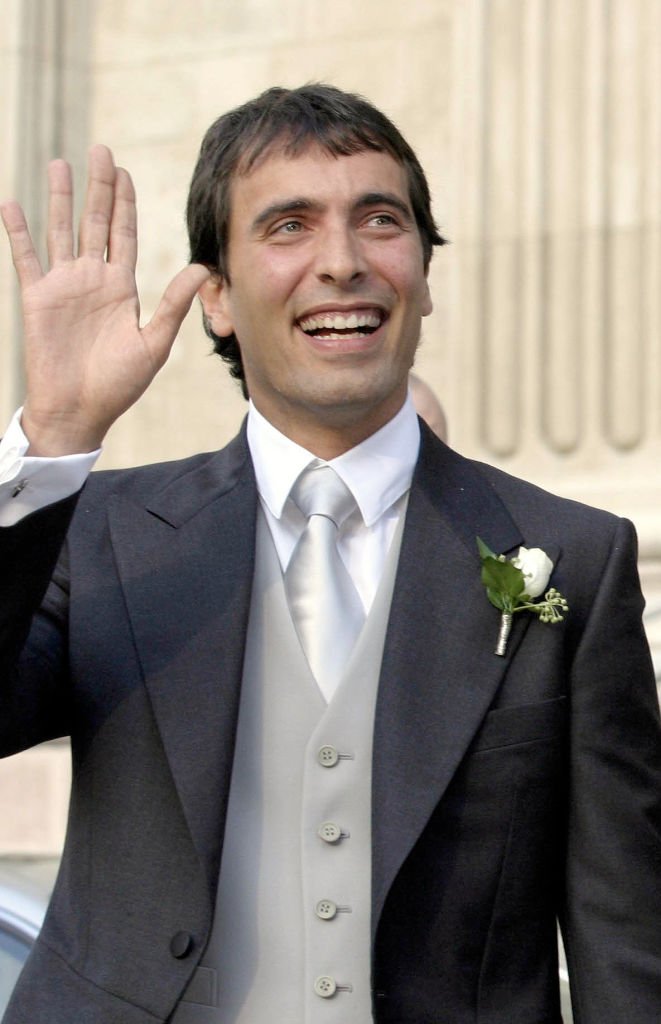 Carlo Ponti Jr, en quittant la basilique Saint-Étienne avec son épouse Andrea Meszaros le 18 septembre 2004. | Source : Getty Images