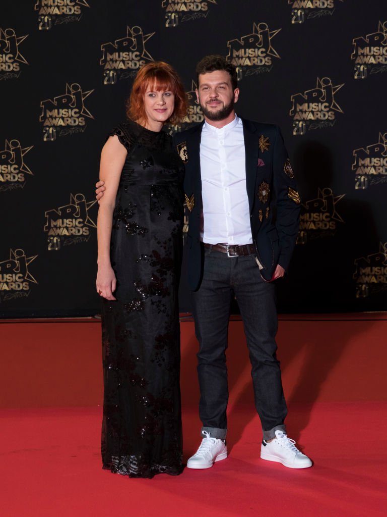 Claudio Capeo et sa femme assistent aux 20èmes NRJ Music Awards à Cannes. | Getty Images