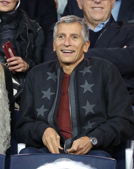 Nagui Fam participe au match de Ligue 1 entre Paris Saint Germain (PSG) et l'Olympique Lyonnais au Parc des Princes le 17 septembre 2017 à Paris. | Photo : Getty Images