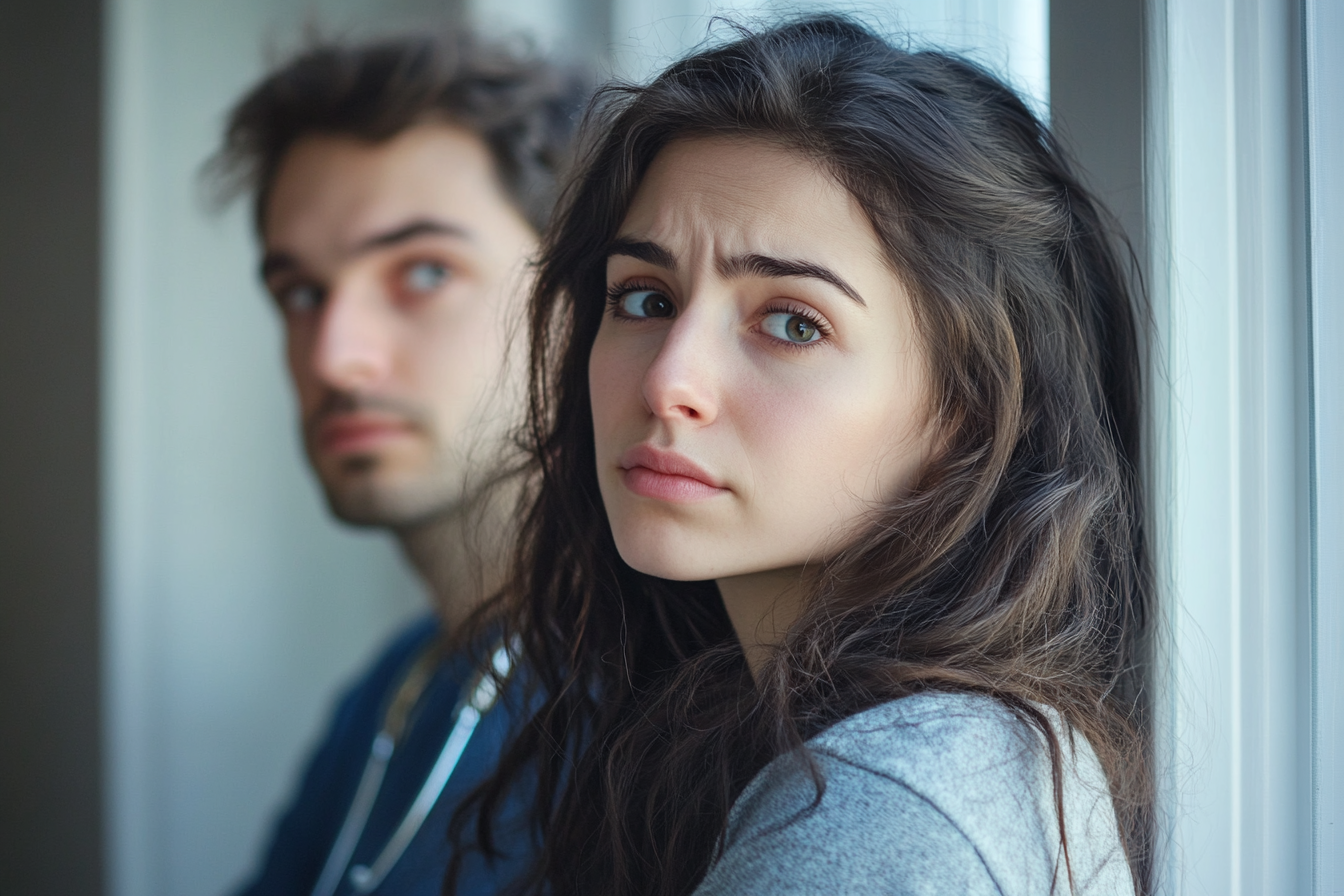 Un couple triste dans le cabinet d'un médecin | Source : Midjourney