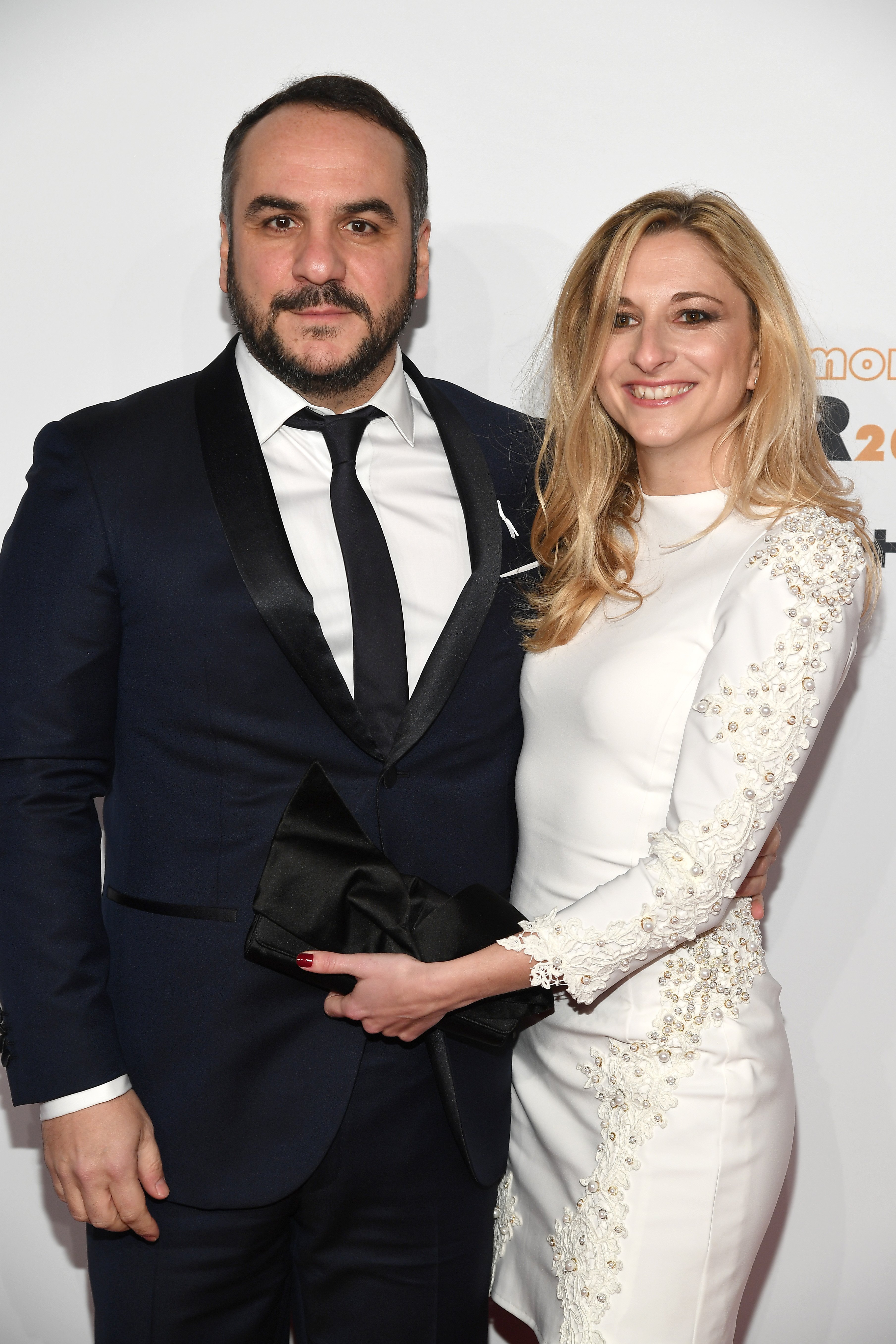 L'acteur François-Xavier Demaison et sa femme | source : Getty Images
