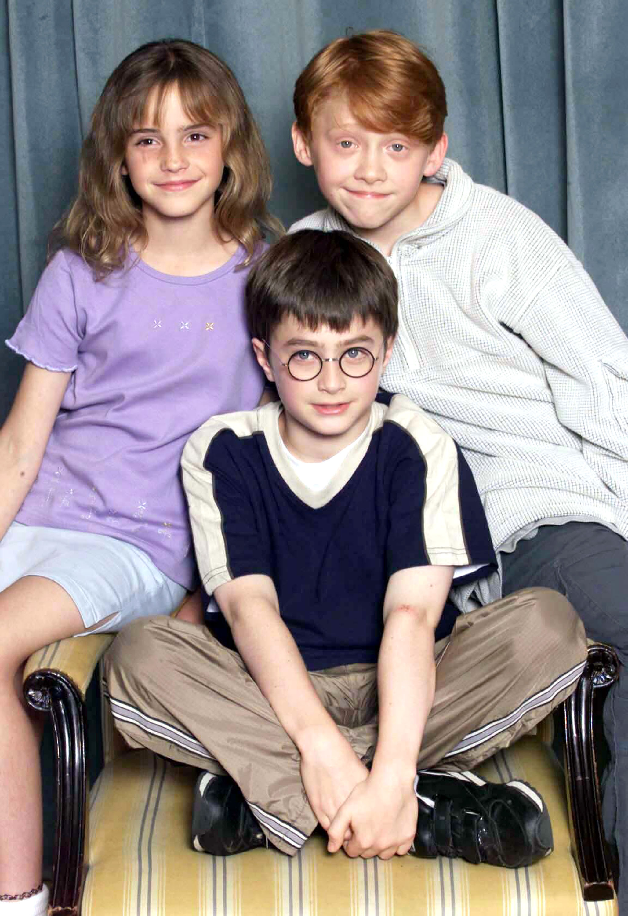 Emma Watson, Daniel Radcliffe et Rupert Grint lors d'un photocall pour "Harry Potter" à Londres, Angleterre, le 23 août 2000 | Source : Getty Images