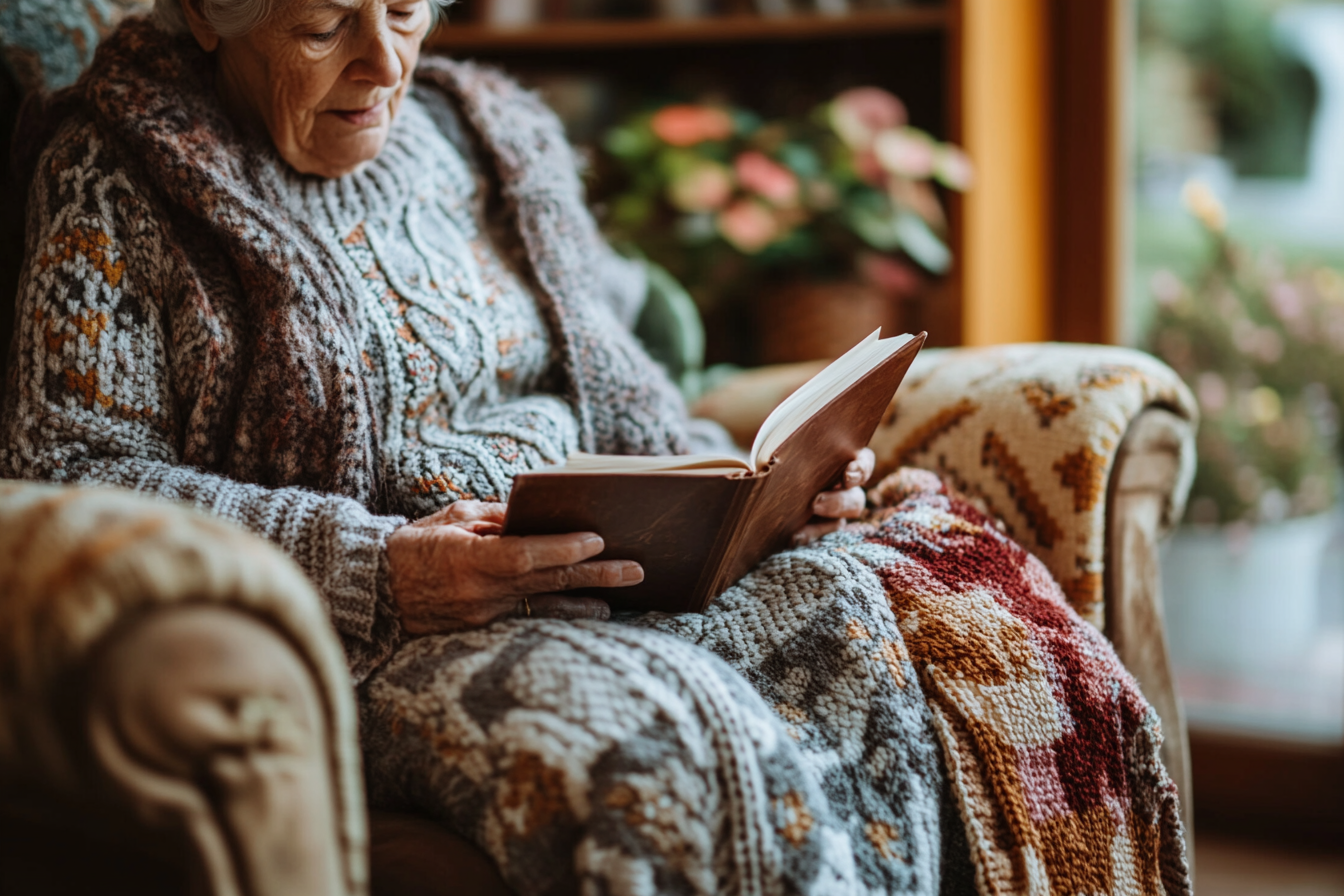 Une femme âgée lisant un livre | Source : Midjourney