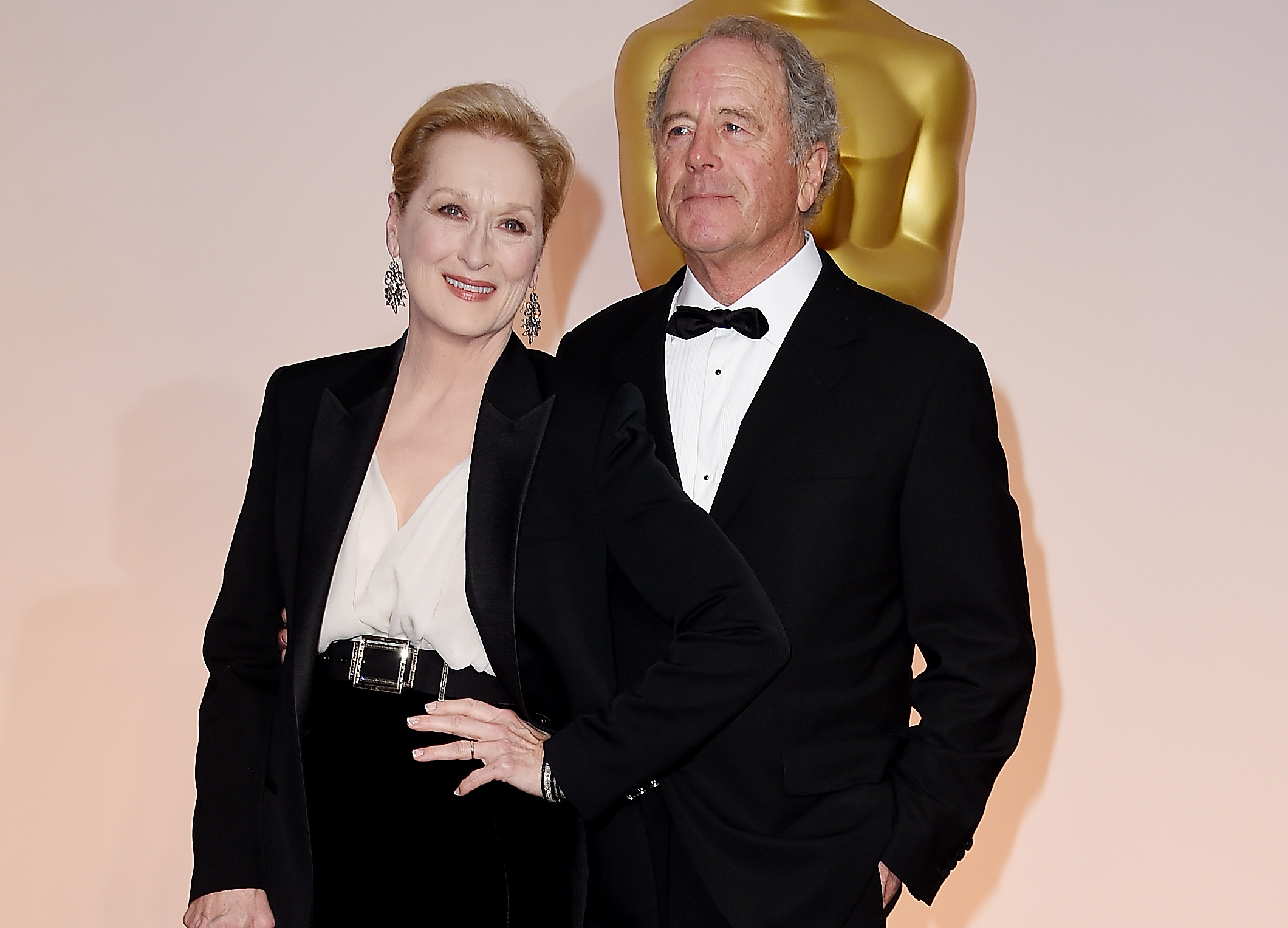 L'actrice Meryl Streep (G) et le sculpteur Don Gummer assistent à la 87e cérémonie annuelle des Oscars au Hollywood & Highland Center le 22 février 2015 à Hollywood, Californie. | Source : Getty Images