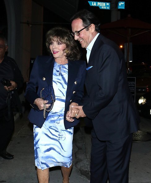 Joan Collins et Percy Gibson, le 14 novembre 2019 à Los Angeles, Californie | Photo : Getty Images