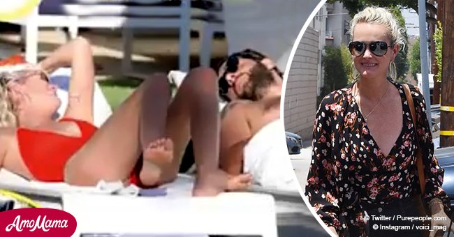 Laeticia Hallyday dans un maillot de bain rouge se détend avec un autre homme à Palm Springs