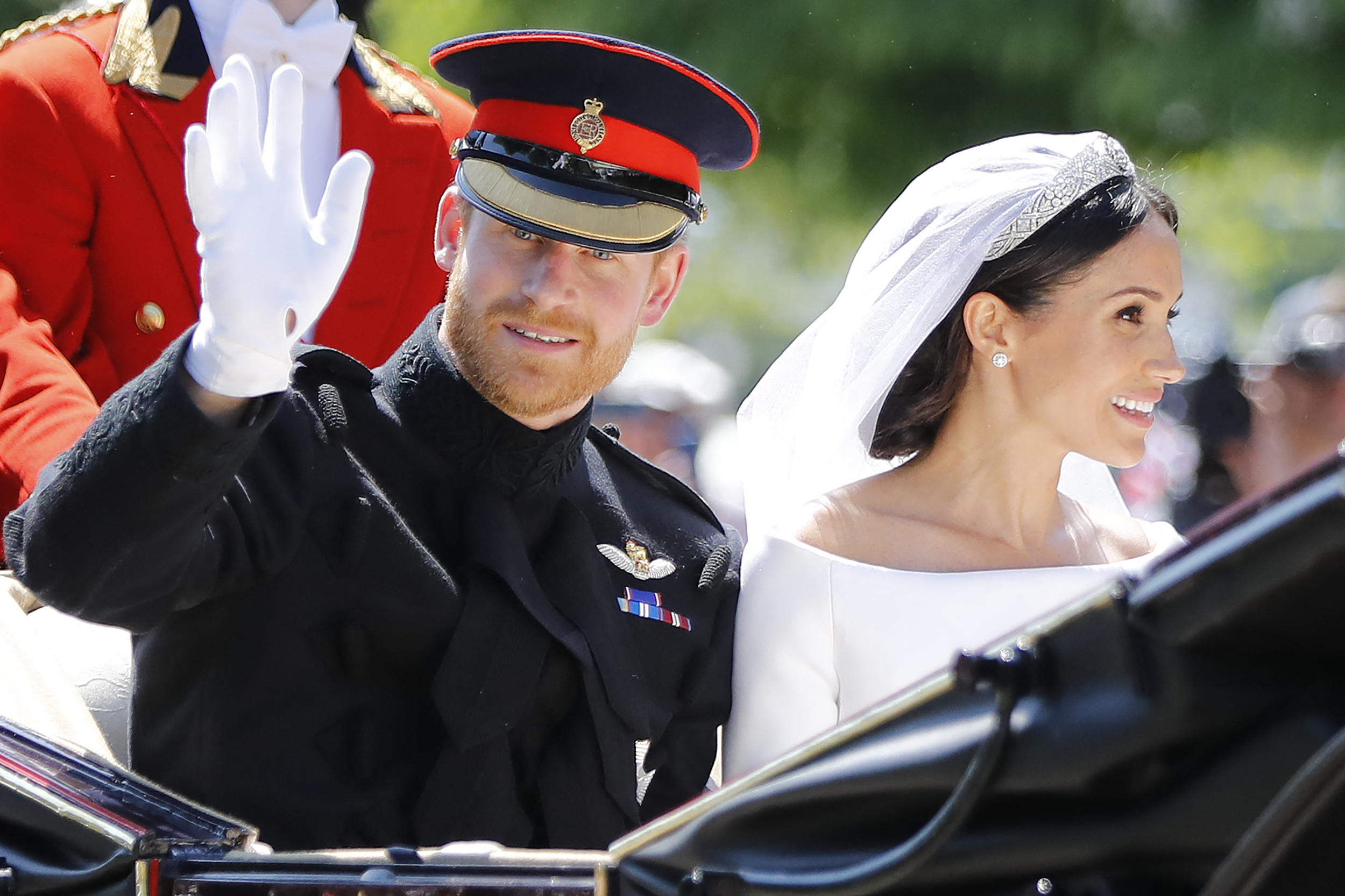 Le prince Harry et Meghan Markle lors de leur procession en calèche sur la longue marche, le 19 mai 2018, à Windsor, en Angleterre. | Source : Getty Images