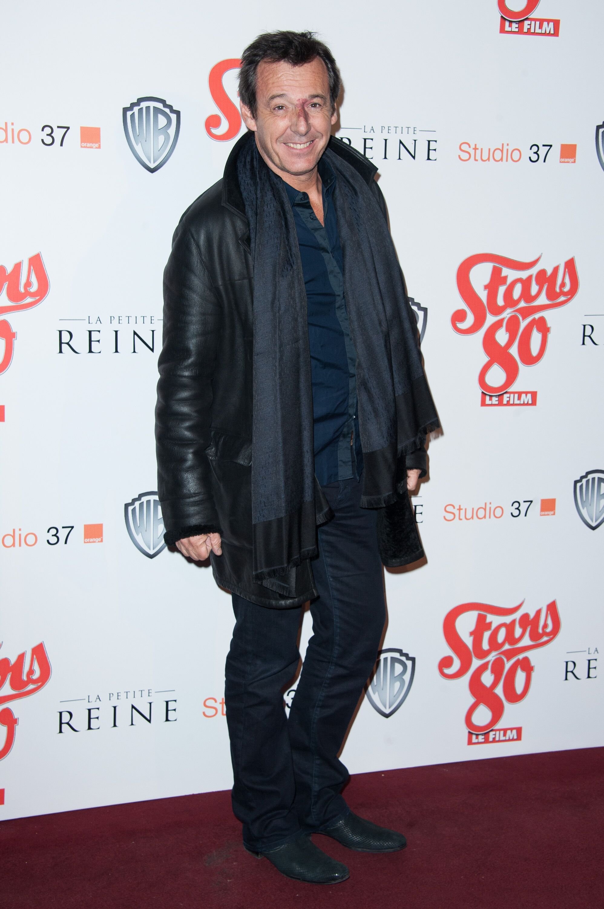 Jean-Luc Reichmann assiste à la première du film 'Stars 80' au Grand Rex le 19 octobre 2012 à Paris, France. | Photo : Getty Image