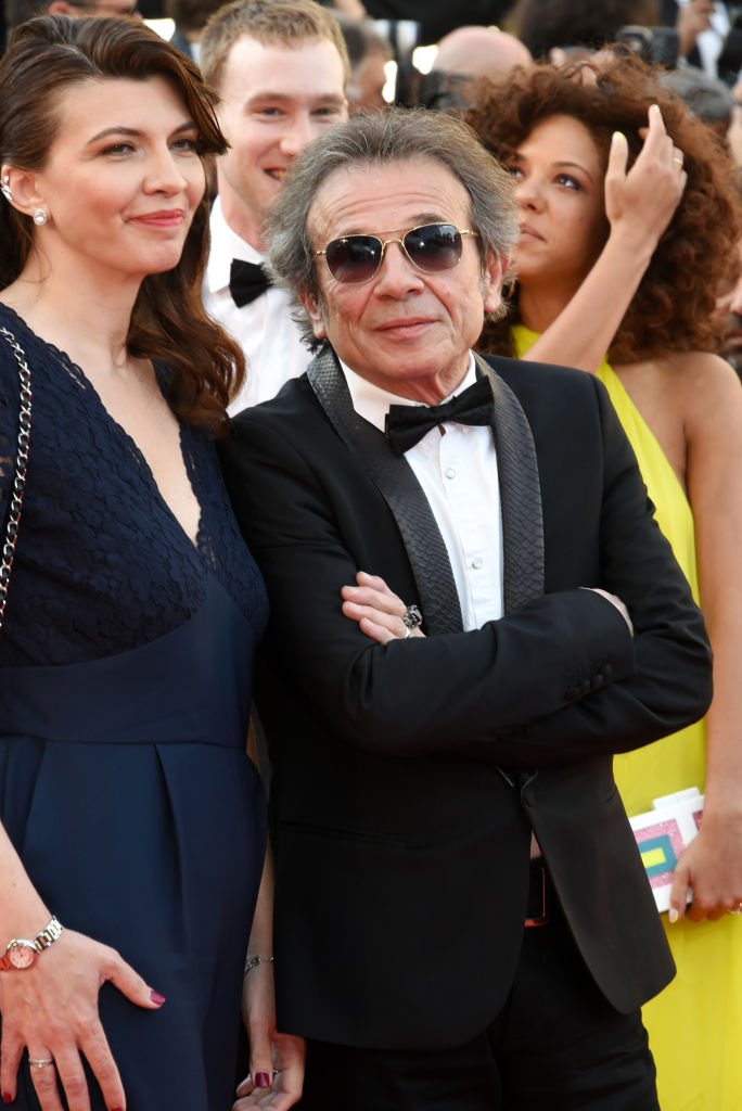 Philippe Manœuvre et son épouse Candice de la Richardière assistent à la projection de "Les Misérables" lors de la 72ème édition du Festival de Cannes le 15 mai 2019 à Cannes, France. | Photo : Getty Images