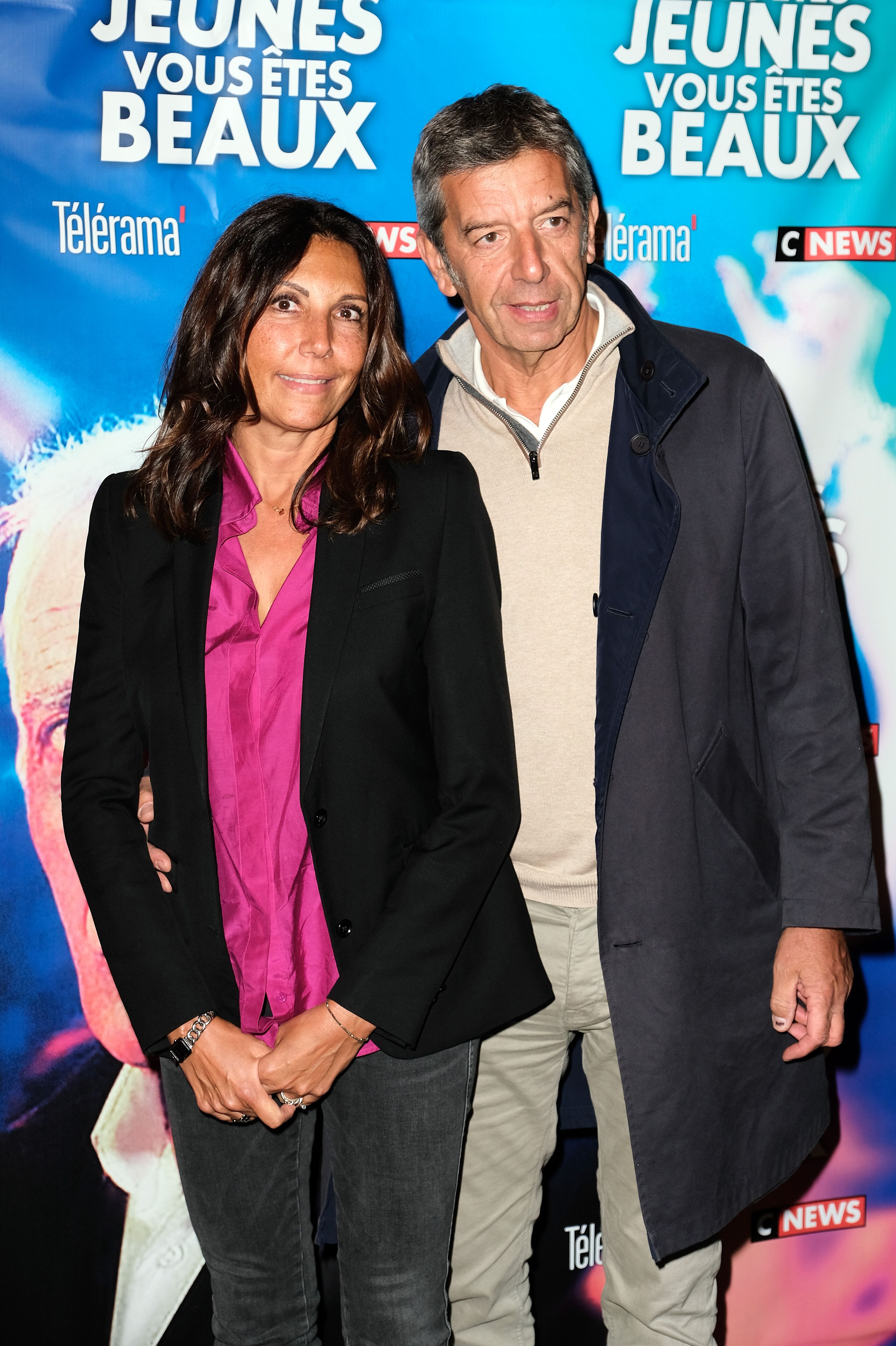 Michel Cymes et son épouse Nathalie Cymes au Cinéma Gaumont Opéra le 23 septembre 2019 à Paris, France. | Photo : Getty Images