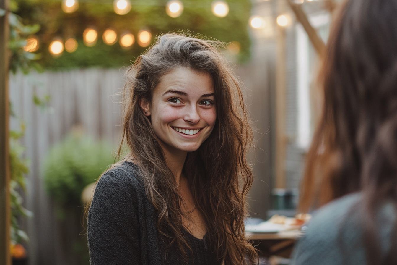 A woman smiling nervously | Source: Midjourney