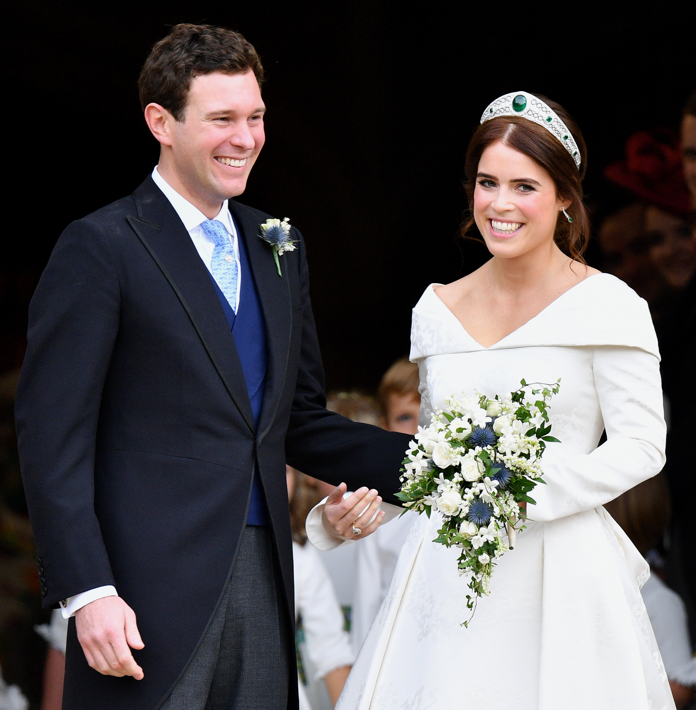 Jack Brooksbank et la princesse Eugenie quittant la chapelle St George après leur cérémonie de mariage, le 12 octobre 2018 à Windsor, en Angleterre. | Source : Getty Images