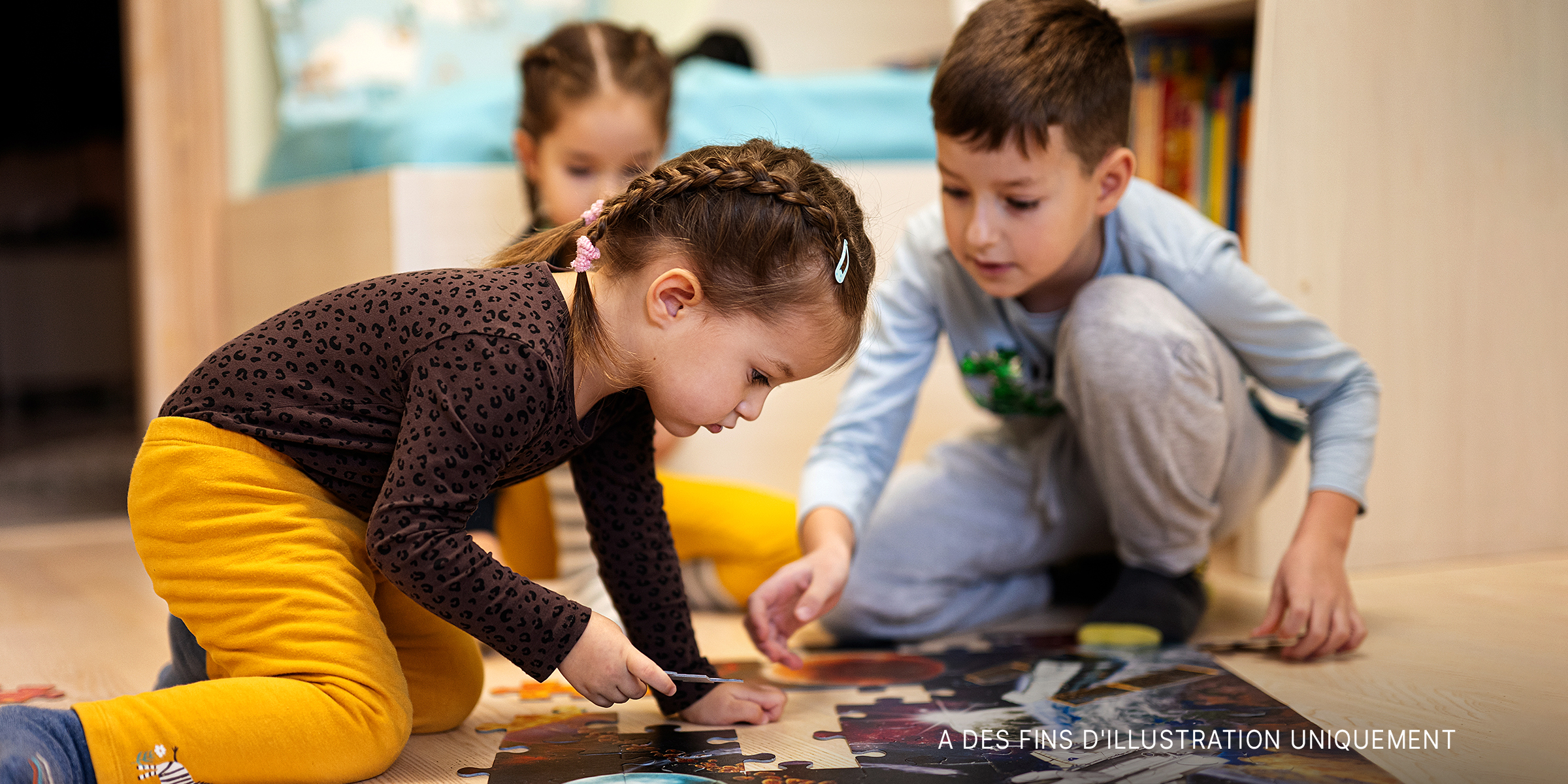 Des enfants font un puzzle | Source : Shutterstock