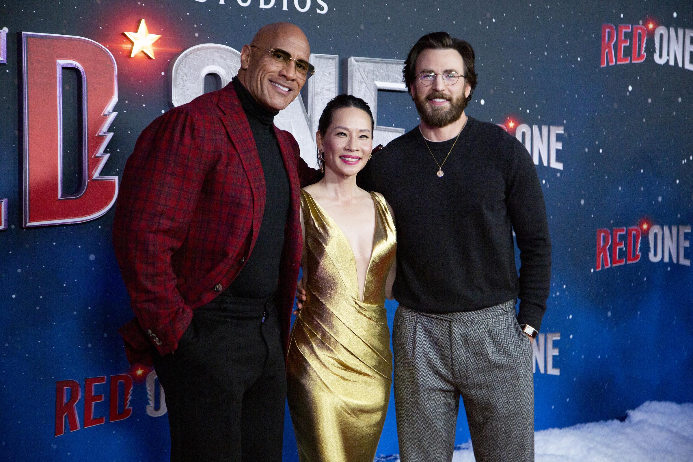 Dwayne Johnson, Lucy Liu, and Chris Evans le 11 novembre 2024, à New York | Source : Getty Images