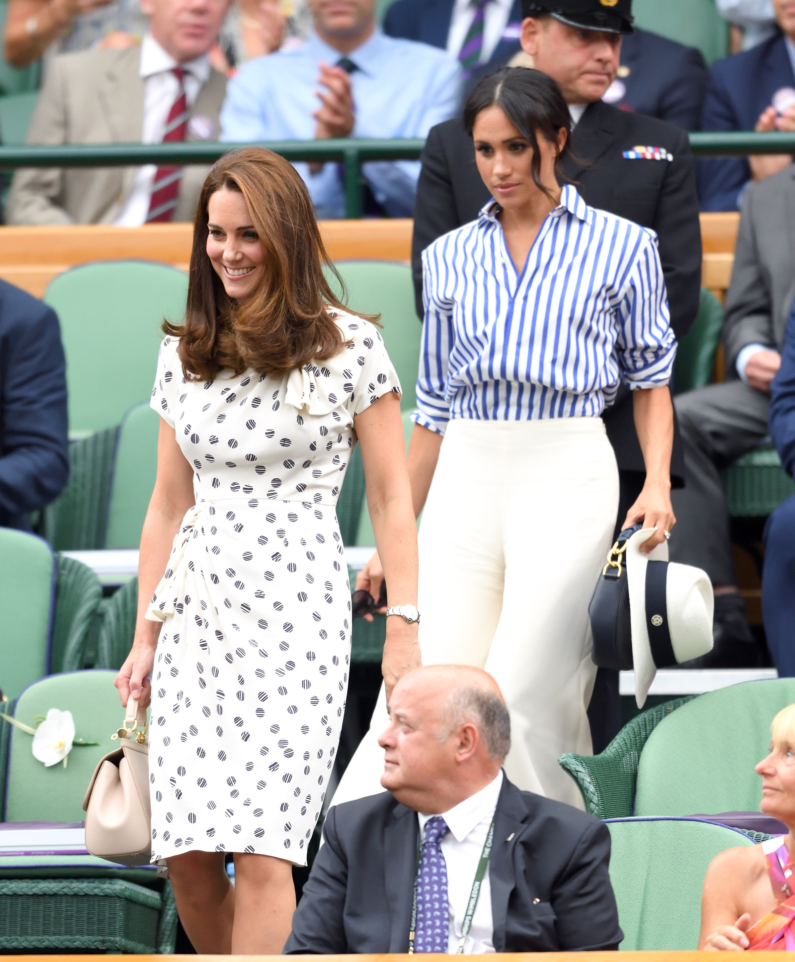 La princesse Catherine et Meghan Markle lors de la douzième journée des championnats de tennis de Wimbledon au All England Lawn Tennis and Croquet Club, le 14 juillet 2018 à Londres, en Angleterre | Source : Getty Images