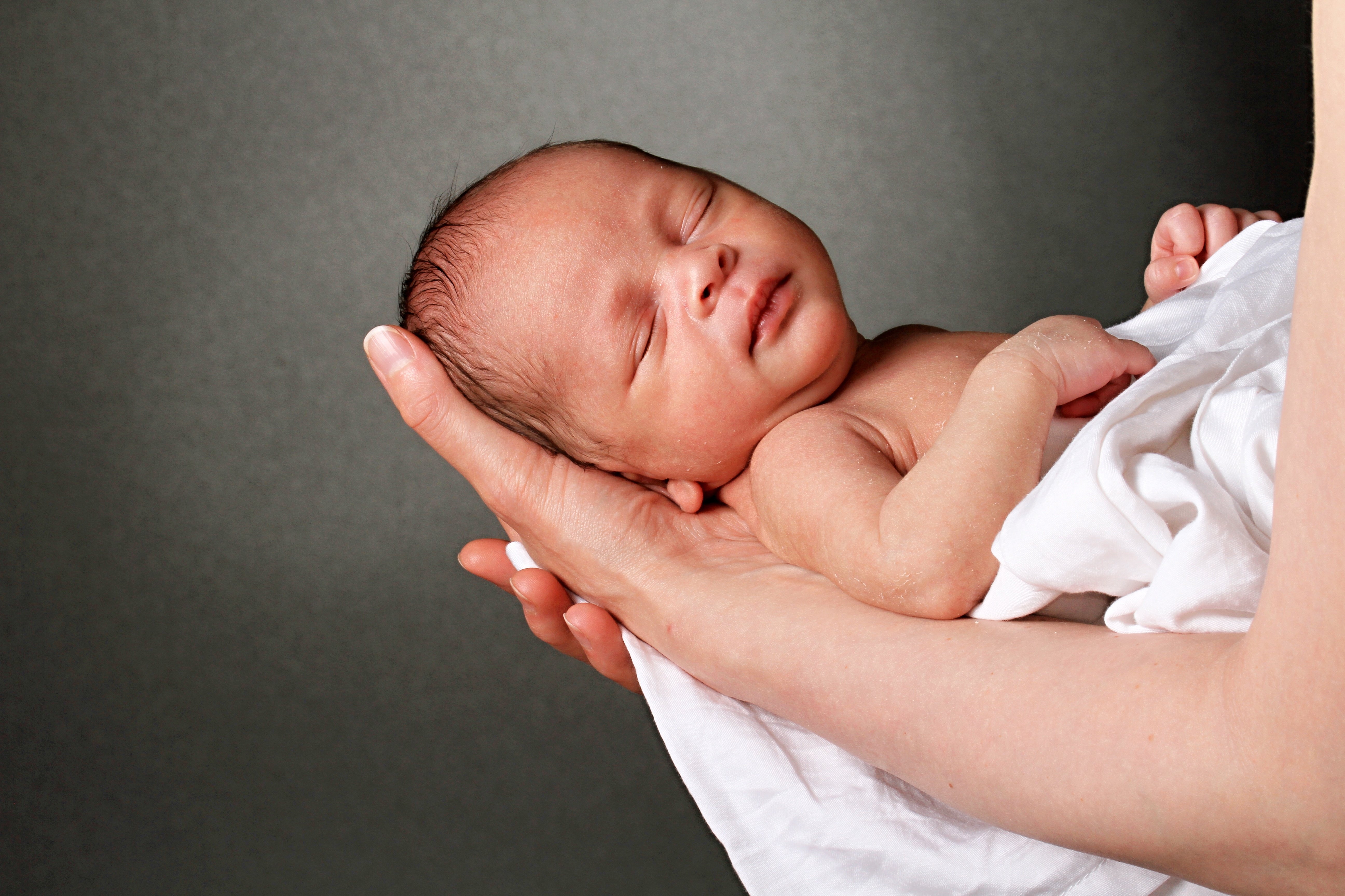 A new born baby in mother's Arms | Image: Shutterstock